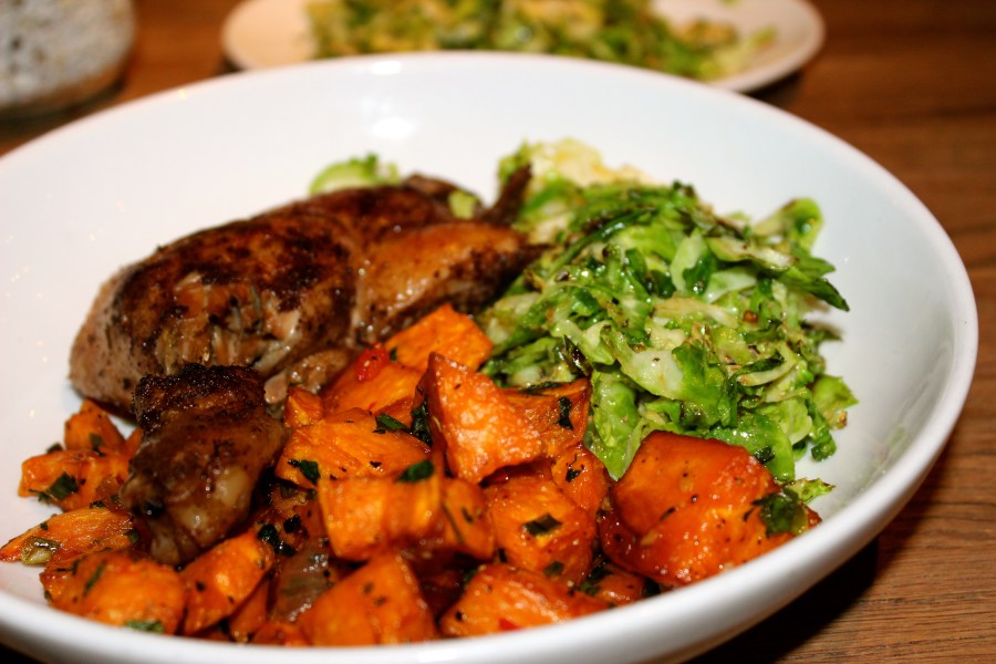 Duck confit, sweet potato hash and brussels sprouts at H.G Sply Co. in Dallas, TX